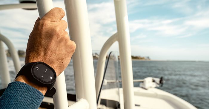 Four hands with Mercury Marine 1st Mate wrist bands
