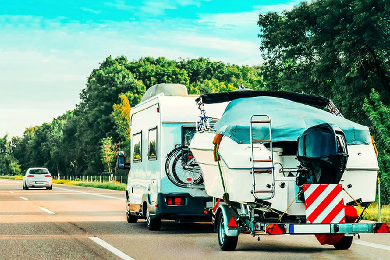 Take Your Boat Camping: Towing a Boat With an RV