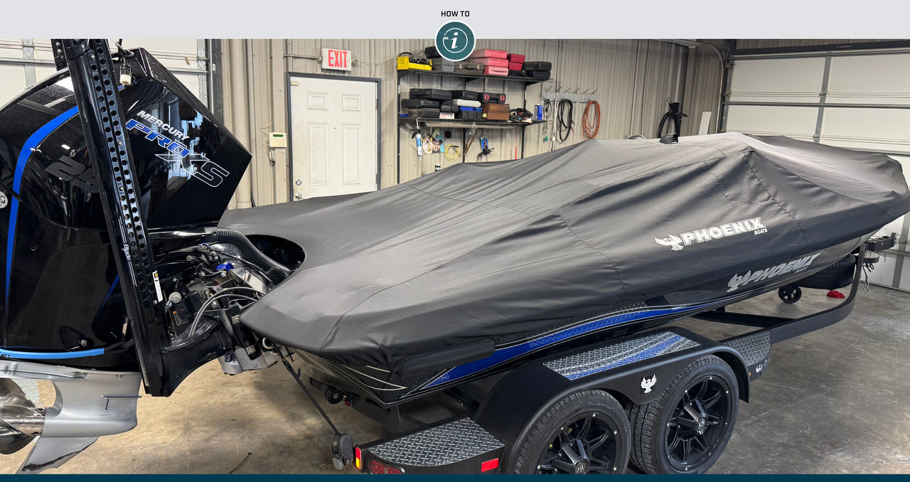 photo of a boat being stored in a garage with a Mercury Pro XS engine on it