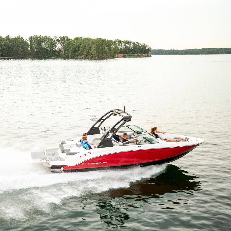 Boat cruising through the water using a Mercury Marine Quicksilver Engine